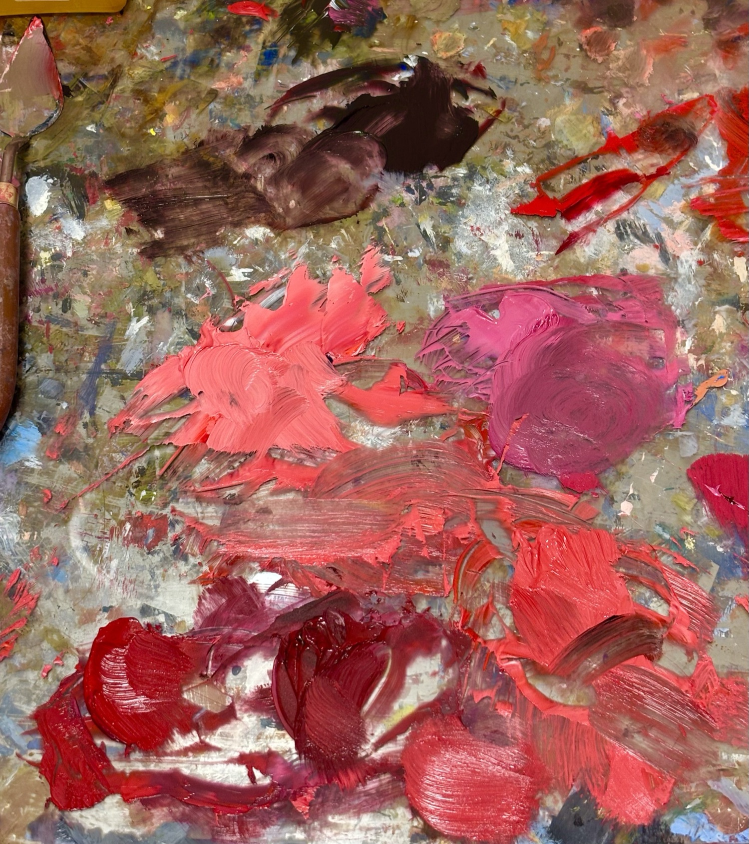 Malerpalett med rode toner